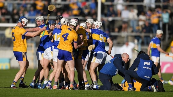16 May 2026; Clare and Tipperary players tussle while Mark Rodgers of Clare receives medical attention for an injury during the Munster GAA Senior Hurling Championship Round 4 match between Tipperary and Clare at FBD Semple Stadium in Thurles, Tipperary.