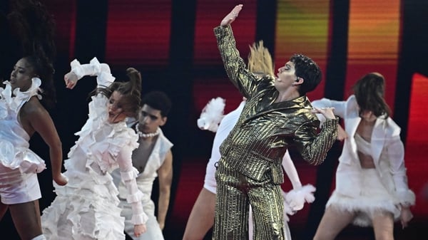 Austrian singer Johannes Pietsch aka JJ, winner of the 2025 Eurovision Song Contest (ESC) performs during the final of the Eurovision Song Contest 2026 (ESC) at Wiener Stadthalle in Vienna, Austria on 16 May, 2026. (Photo by Tobias SCHWARZ / AFP)