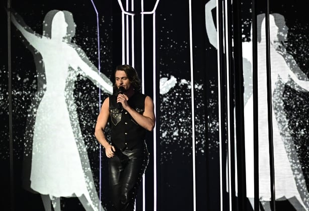 Maltese singer Aidan Cassar, aka Aidan and representing Malta with the song Bella, performs during the final of the Eurovision Song Contest 2026 (ESC) at Wiener Stadthalle in Vienna, Austria on 16 May, 2026. (Photo by Tobias Schwarz/AFP)