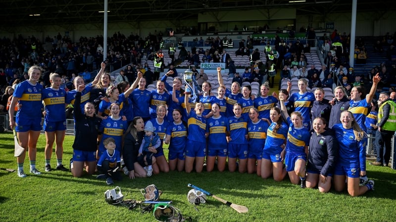 16 May 2026; Tipperary captain Caoimhe McCarthy ànd her team mates with the cup after the Munster Senior Camogie Championship final match between Tipperary and Waterford at FBD Semple Stadium in Thurles, Tipperary. Photo by Ray McManus/Sportsfile