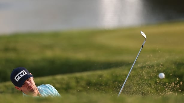 NEWTOWN, PENNSYLVANIA - MAY 16: Alex Smalley of the United States hits out of a greenside bunker on the 17th hole during the third round of the PGA Championship at Aronimink Golf Club on May 16, 2026 in Newtown, Pennsylvania. (Photo by Carl Recine/Getty Images)