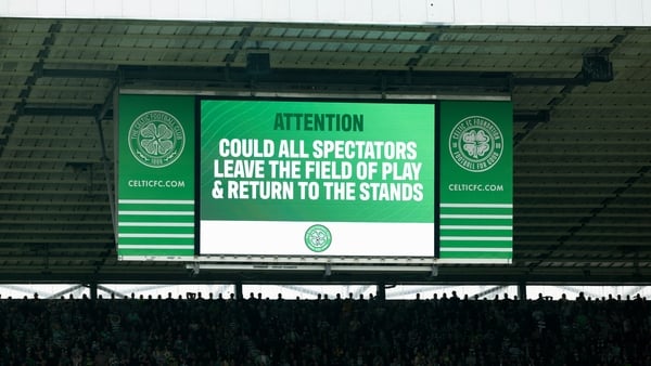 GLASGOW, SCOTLAND - MAY 16: The LED screens displays a message asking supporters to leave the field of play during a William Hill Premiership match between Celtic and Heart of Midlothian at Celtic Park, on May 16, 2026, in Glasgow, Scotland. (Photo by Cra