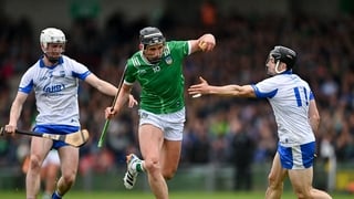 Gearóid Hegarty of Limerick in action against Sean Mackey, left, and Jamie Barron of Waterford