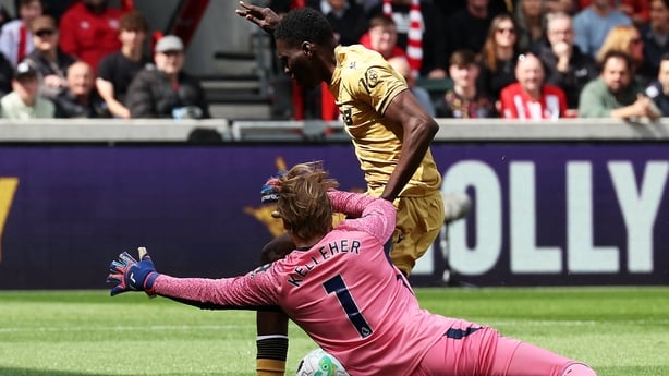 Brentford's Irish goalkeeper #01 Caoimhin Kelleher (L) fouls Crystal Palace's Senegalese midfielder #07 Ismaila Sarr (R) leading to a penalty after a VAR check during the English Premier League football match between Brentford and Crystal Palace at the Gtech Community Stadium in London on May 17, 20
