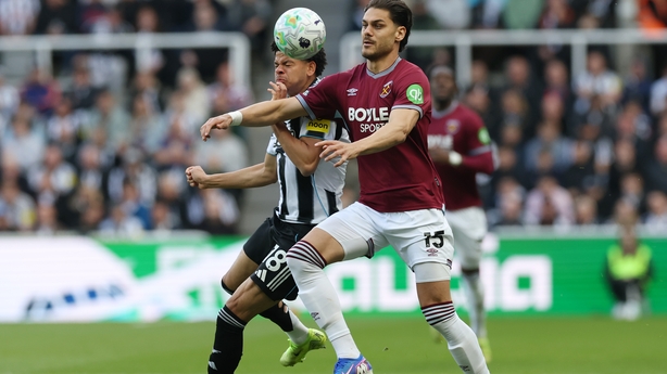 William Osula of Newcastle United and Konstantinos Mavropanos of West Ham United battle for possession during the Premier League match between Newcastle United and West Ham United at St James' Park on May 17, 2026 in Newcastle upon Tyne, England.