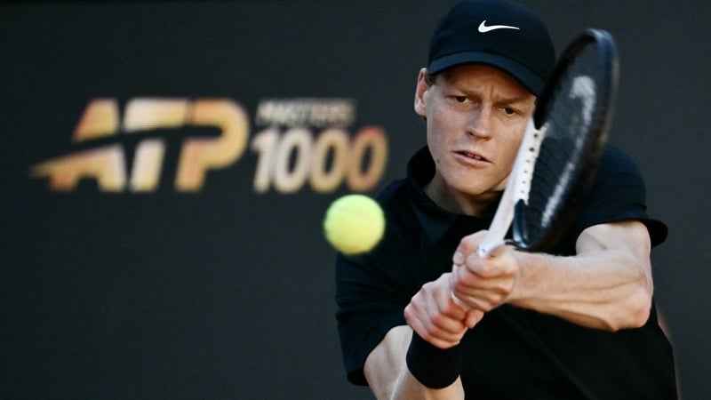 Italy's Jannik Sinner hits a return to Norway's Casper Ruud during the men's final of the ATP Rome Open tennis tournament at Foro Italico in Rome on May 17, 2026.