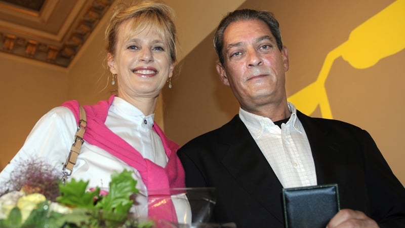 US novelist Paul Auster (R) and his wife US writer Siri Hustvedt (L) pose during an award ceremony after he received the "Grand Vermeil" medal from the mayor of Paris Bertrand Delanoe, on June 10, 2010 in Paris. Auster is the guest of honour of the 2010 e