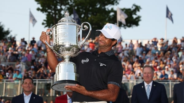 NEWTOWN, PENNSYLVANIA - MAY 17: Aaron Rai of England celebrates with The Wanamaker Trophy after winning during the final round of the PGA Championship at Aronimink Golf Club on May 17, 2026 in Newtown, Pennsylvania. (Photo by Andrew Redington/Getty Images