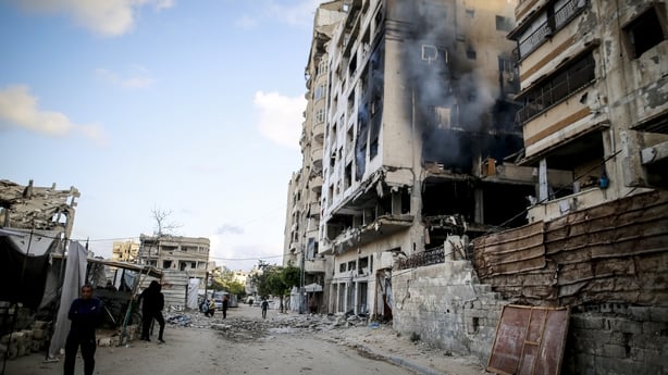 A view of the damaged building and its surroundings after an Israeli attack on Rimal neigborhood in Gaza City, Gaza, Palestine