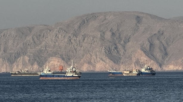 Vessels are seen anchored in the Strait of Hormuz, off the port city of Khasab on Oman's northern Musandam Peninsula