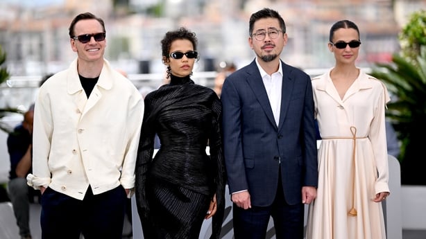Michael Fassbender, Taylor Russell, Na Hong-jin and Alicia Vikander pose during the Hope photocall at the 79th annual Cannes Film Festival