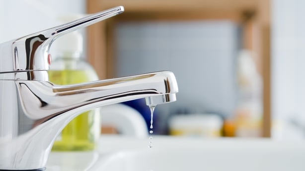 A dripping faucet