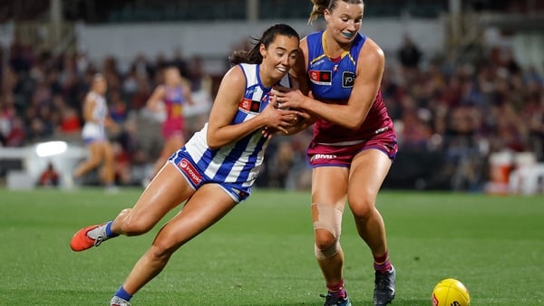 Blaithin Bogue, former Fermanagh footballer and currently with the Kanagroos, competes with former Dublin player Jennifer Dunne, now of the Lions
