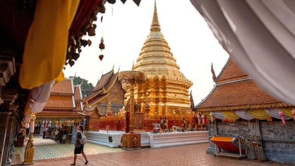 people walk around Chiang Mai’s iconic Doi Suthep in thailand