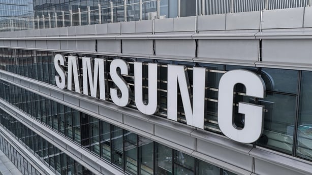 A grey office building with the Samsung branding