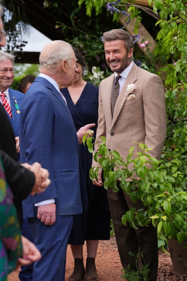 LONDON, ENGLAND - MAY 18: King Charles III talks with Sir David Beckham during the press day ahead of the 2026 RHS Chelsea Flower Show at The Royal Hospital Chelsea on May 18, 2026 in London, England. (Photo by Yui Mok - WPA Pool/Getty Images)