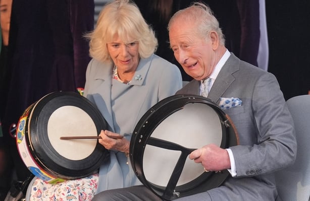 King Charles and Queen Camilla play traditional Irish bodhran drums at Thompson Dock, Belfast 