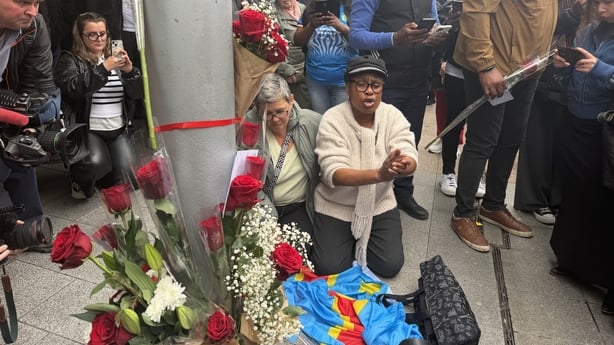 People mourn the death of Yves Sakila on Dublin's Henry Street