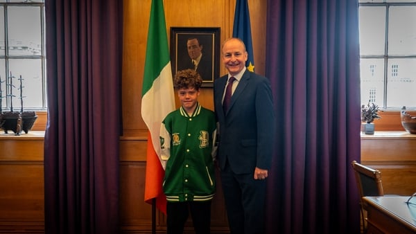 Watch: ‘Brave’ boy who rescued family welcomed to Dáil