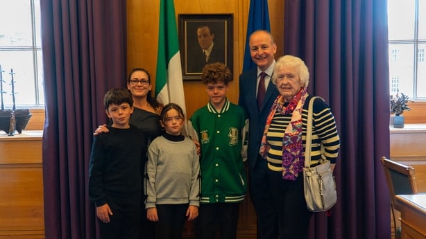 Taoiseach Micheál Martin with Austin Appelbee and his family