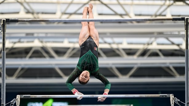Emma Slevin competes in the Uneven Bars event during the Gymnastics Ireland National Series Sport Ireland National Indoor Arena on the Sport Ireland Campus in Dublin.