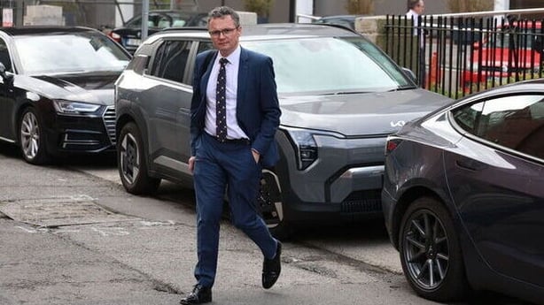Minister for Communications Patrick O'Donovan leaving the meeting