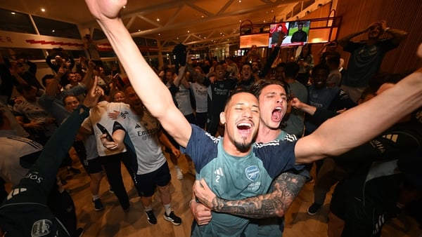 LONDON COLNEY, ENGLAND - MAY 19: (L-R) William Saliba and Riccardo celebrate Arsenal winning the Premier League after watching AFC Bournemouth v Manchester City at Sobha Realty Training Centre on May 19, 2026 in London Colney, England. (Photo by Stuart Ma