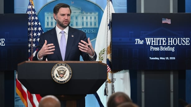 US Vice President JD Vance stands at a podium as he addresses the media during a news briefing in the White House.