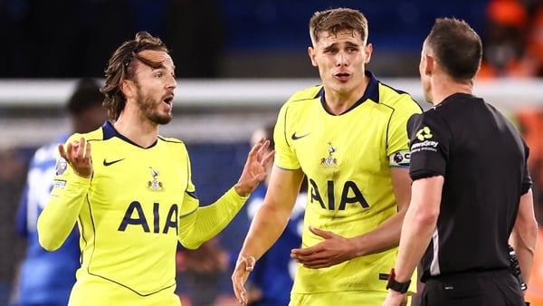 LONDON, ENGLAND - MAY 19: James Maddison of Tottenham Hotspur and Micky van de Ven of Tottenham Hotspur complain to match referee Stuart Attwell during the Premier League match between Chelsea and Tottenham Hotspur at Stamford Bridge on May 19, 2026 in Lo