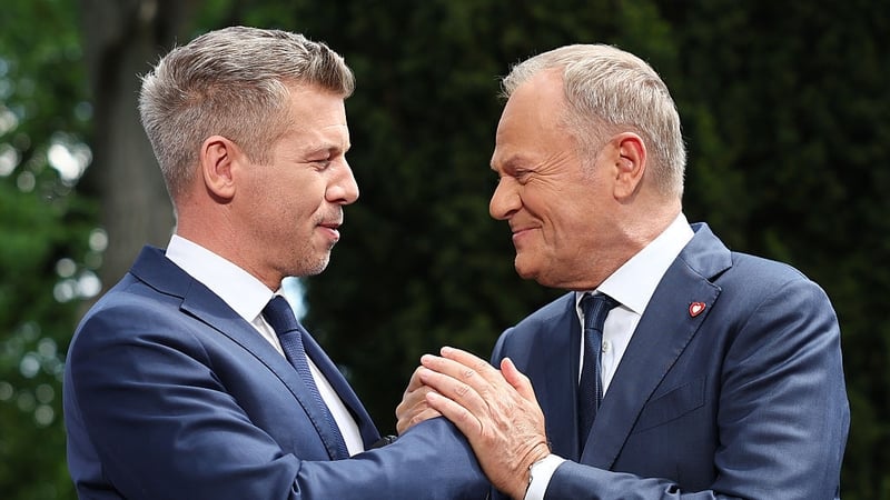 WARSAW, POLAND - MAY 20: Hungarian Prime Minister Peter Magyar (L) and Polish Prime Minister Donald Tusk (R) hold a joint press conference at the Prime Minister's Residence in Warsaw, Poland on May 20, 2026. (Photo by Jakub Porzycki/Anadolu via Getty Imag