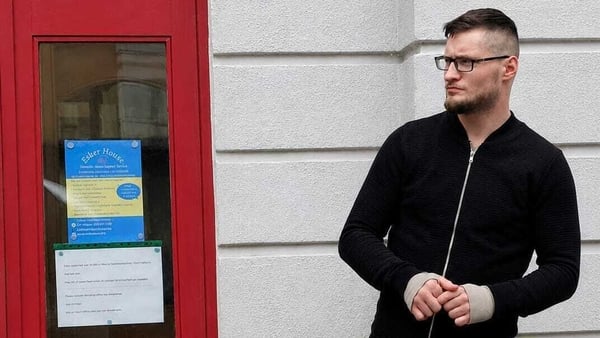 Cory O'Connor, who appeared in court over an online threat to kill Taoiscach Micheal Martin, is pictured outside a building in Athlone