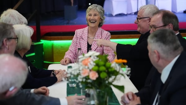 President Catherine Connolly meets guests during a visit to the Leeds Irish Centre