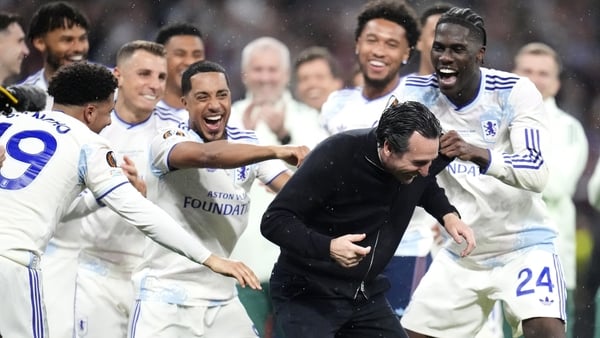 Aston Villa's Youri Tielemans, manager Unai Emery, and Amadou Onana