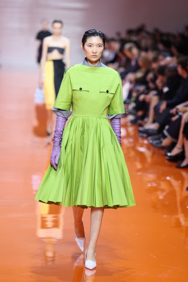 A model walks the runway at the Prada fashion show