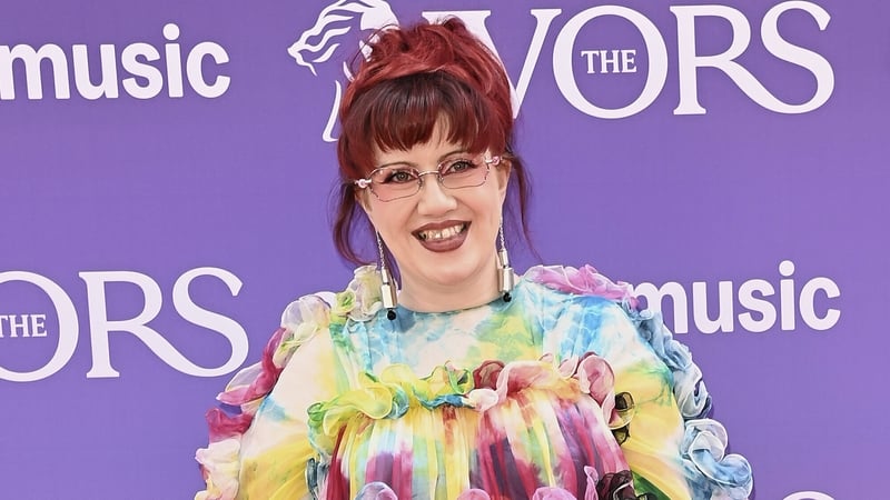 CMAT stuns in patterned gown and platforms at Ivor Novello Awards