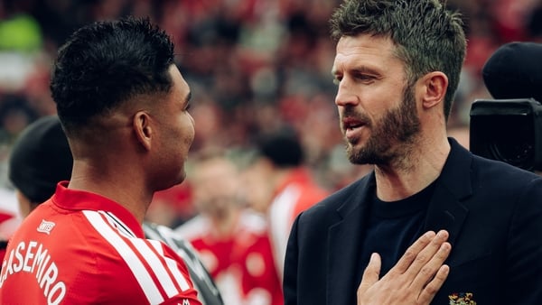MANCHESTER, ENGLAND - MAY 17: Head Coach Michael Carrick of Manchester United speaks to Casemiro after the Premier League match between Manchester United and Nottingham Forest at Old Trafford on May 17, 2026 in Manchester, England. (Photo by Zohaib Alam -