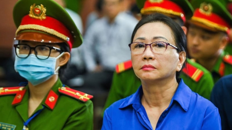 Vietnamese property tycoon Truong My Lan (R) was sentenced to death in 2024 but now faces life in prison instead
