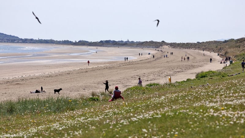 Beach goers pictured enjoying the sunshine on Portmarnock Beach