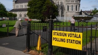Voters at the polling station at St Columba's National School in Glasnevin, Dublin