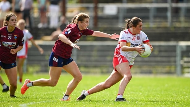 Chloe McCaffrey of Armagh carries the ball away from a Galway player