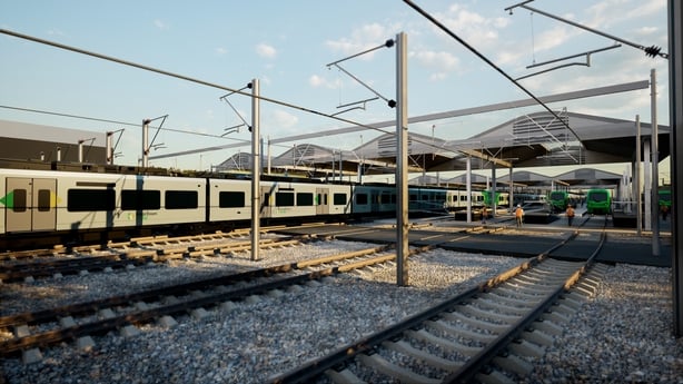 Train tracks and a train far right