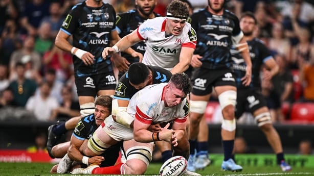 22 May 2026; Harry Sheridan of Ulster drops the ball as he is tackled by Montpellier Hérault Rugby players Domingo Miotti and Jordan Uelese during the 2026 EPCR Challenge Cup final match between Montpellier Hérault Rugby and Ulster at San Mamés Stadium in Bilbao, Spain. Photo by Seb Daly/Sportsfile