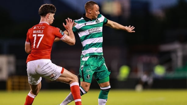 Graham Burke of Shamrock Rovers in action against Sean McHale of Sligo Rovers during the SSE Airtricity Men's Premier Division match between Shamrock Rovers and Sligo Rovers at Tallaght Stadium in Dublin.