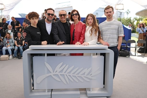 CANNES, FRANCE - MAY 20: (L-R) Boris Kudrin, Dmitriy Mazurov, Andrey Zvyagintsev, Iris Lebedeva, Varvara Shmykova and Yuriy Zavalnyouk pose during the "Minotaur" photocall at the 79th annual Cannes Film Festival at Palais des Festivals on May 20, 2026 in Cannes, France. (Photo by Aurore Marechal/Get