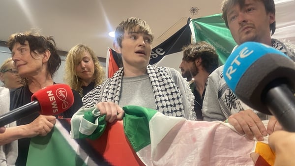 Members of the Global Sumud Flotilla arriving back at Dublin Airport