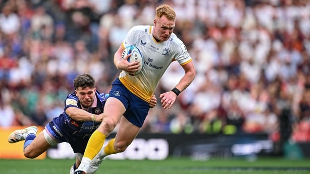 Ciarán Frawley of Leinster is tackled by Matthieu Jalibert of Union Bordeaux Bègles during the Investec Champions Cup final match between Leinster and Union Bordeaux Bégles at San Mamés Stadium in Bilbao, Spain.