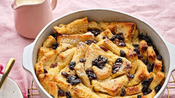 Bread and butter pudding with cream on the side
