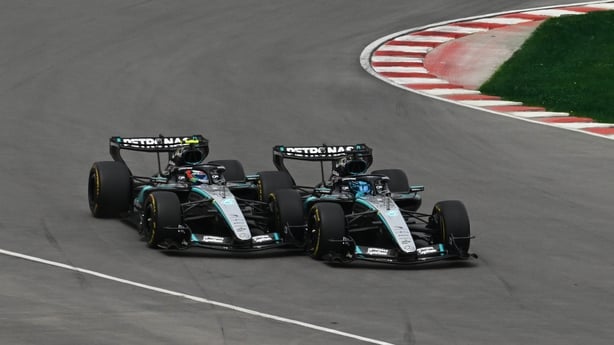 George Russell of Great Britain driving the (63) Mercedes AMG Petronas F1 Team W17 and Andrea Kimi Antonelli of Italy driving the (12) Mercedes AMG Petronas F1 Team W17 battle for the lead during the Sprint ahead of the F1 Grand Prix of Canada at Circuit Gilles-Villeneuve on May 23, 2026 in Montreal