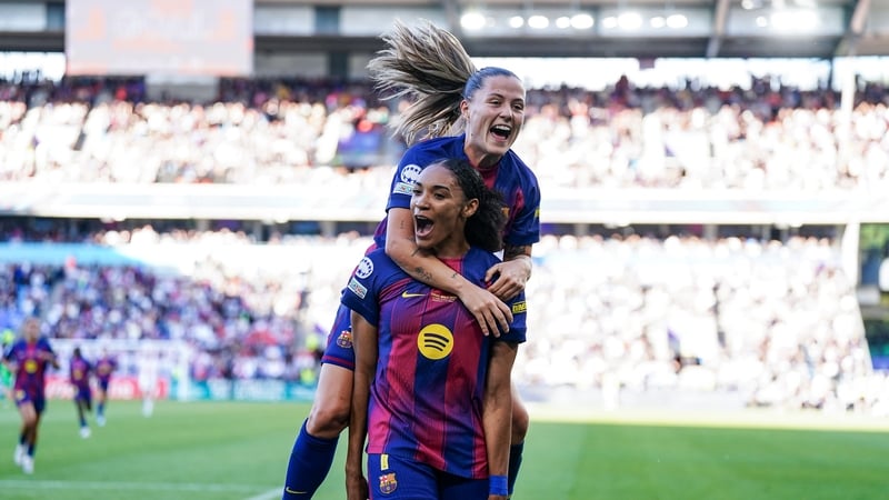 Barcelona push four past Lyon to win Champions League