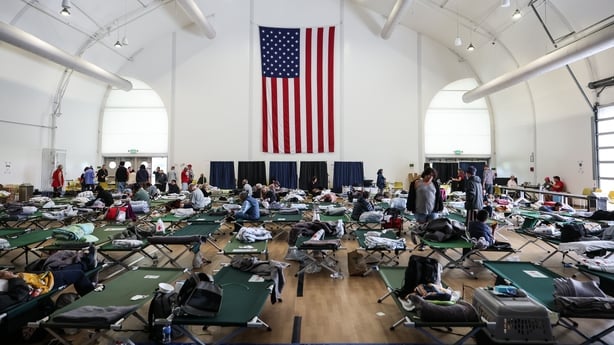 People's belongings and beds cots in an evacuation centre due to the chemical leak.